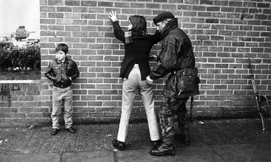 A British soldier searches a teenager in Belfast, Northern Ireland, during the Troubles in 1971