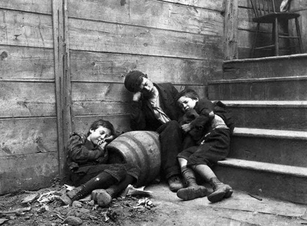 Three Children Sleeping in a Dirty Alley