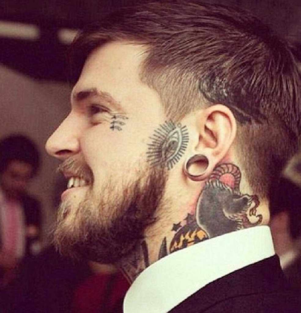 man-with-cool-face-tattoos