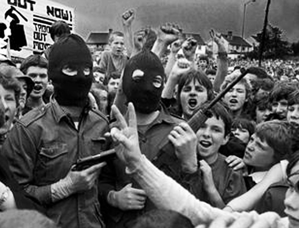 IRA TURN UP AT A 'TROOPS Out' rally in Andersonstown Belfast.pic brendan murphy august 1980