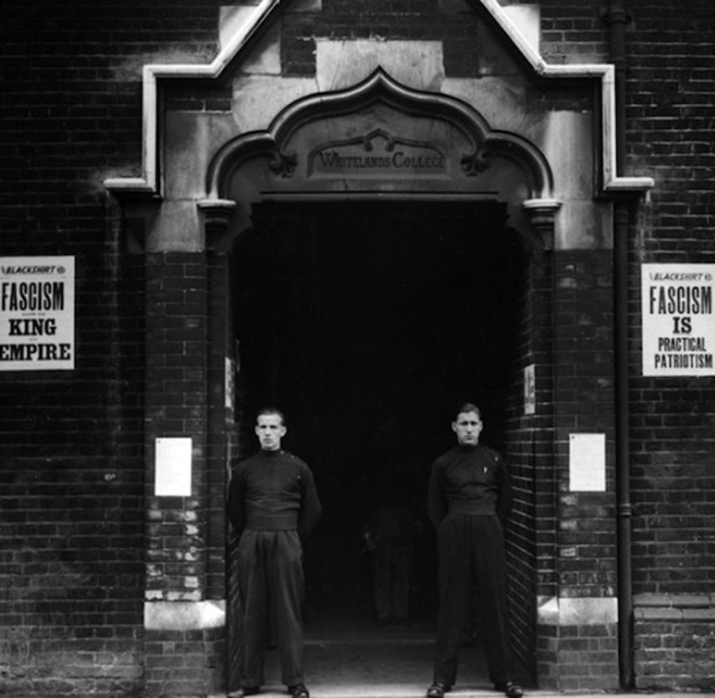 September 1933: Blackshirts on guard at the entrance to the Headquarters of the British Union of Fascists on the King's Road, Chelsea. (Photo by Topical Press Agency/Getty Images)