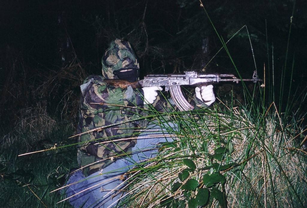 a-volunteer-of-the-real-irish-republican-army-rira-armed-with-an-akm-assault-rifle-british-occupied-north-of-ireland