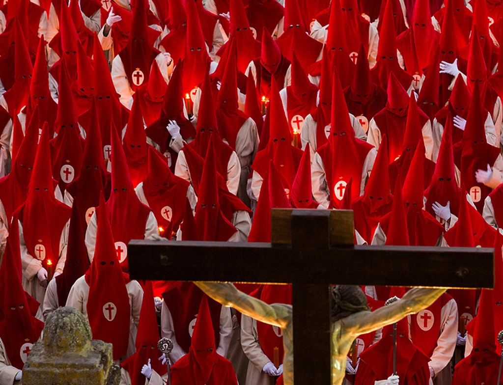 Penitents take part in the "Procesion del Silencio"  (Silence Procession) by the "Cristo de las Injurias" brotherhood, during the Holy Week in Zamora, Spain, Wednesday, April 1, 2015. Hundreds of processions take place throughout Spain during the Easter Holy Week. (AP Photo/Andres Kudacki)