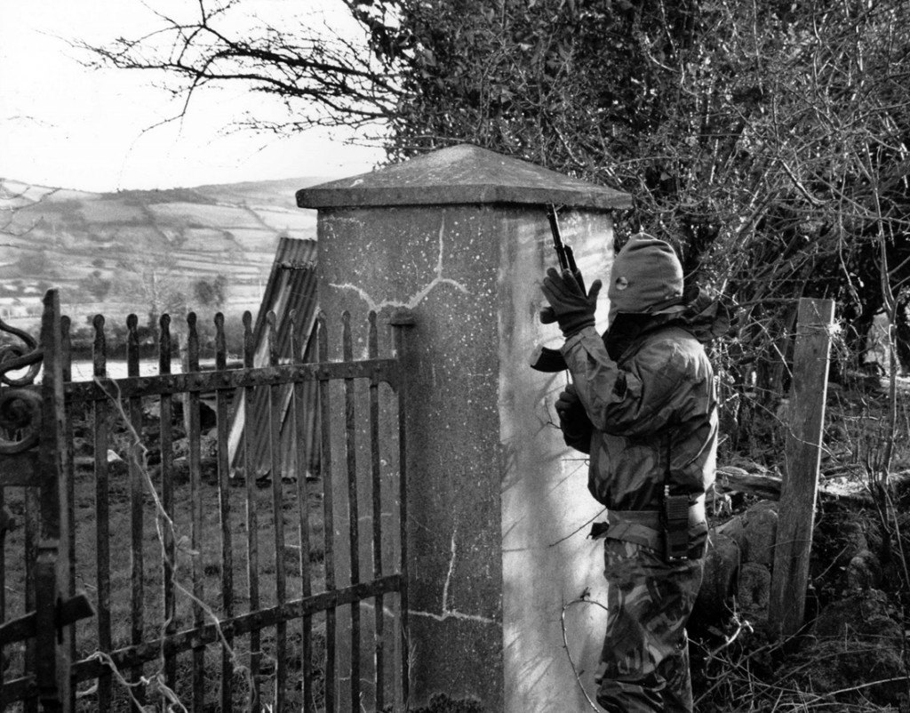 a-volunteer-of-the-irish-republican-army-on-active-service-in-the-british-occupied-north-of-ireland-armed-with-an-akm-assault-rifle-early-1990s