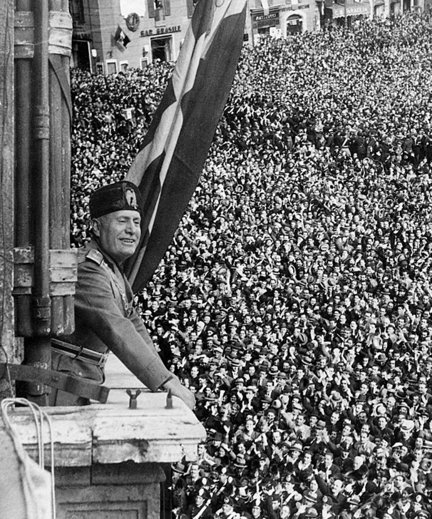 benito-mussolini-addressing-crowds-on-during-the-declaration-of-the-picture-id530796418
