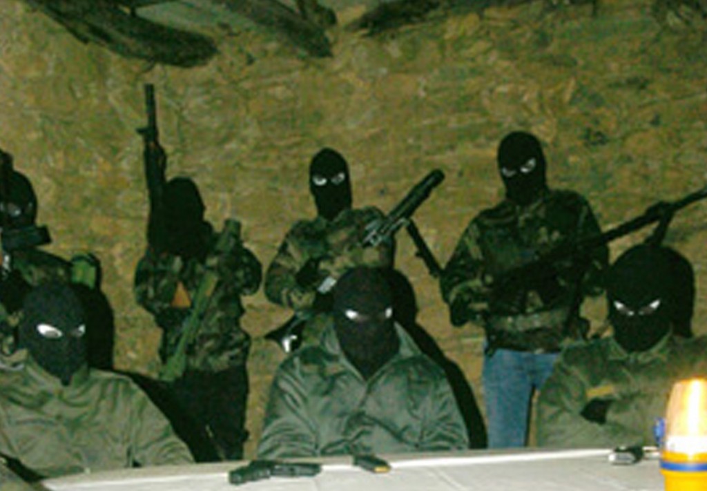 FLNC from the "October 22"  faction making a clandestine nightime statement in the Corsican hills