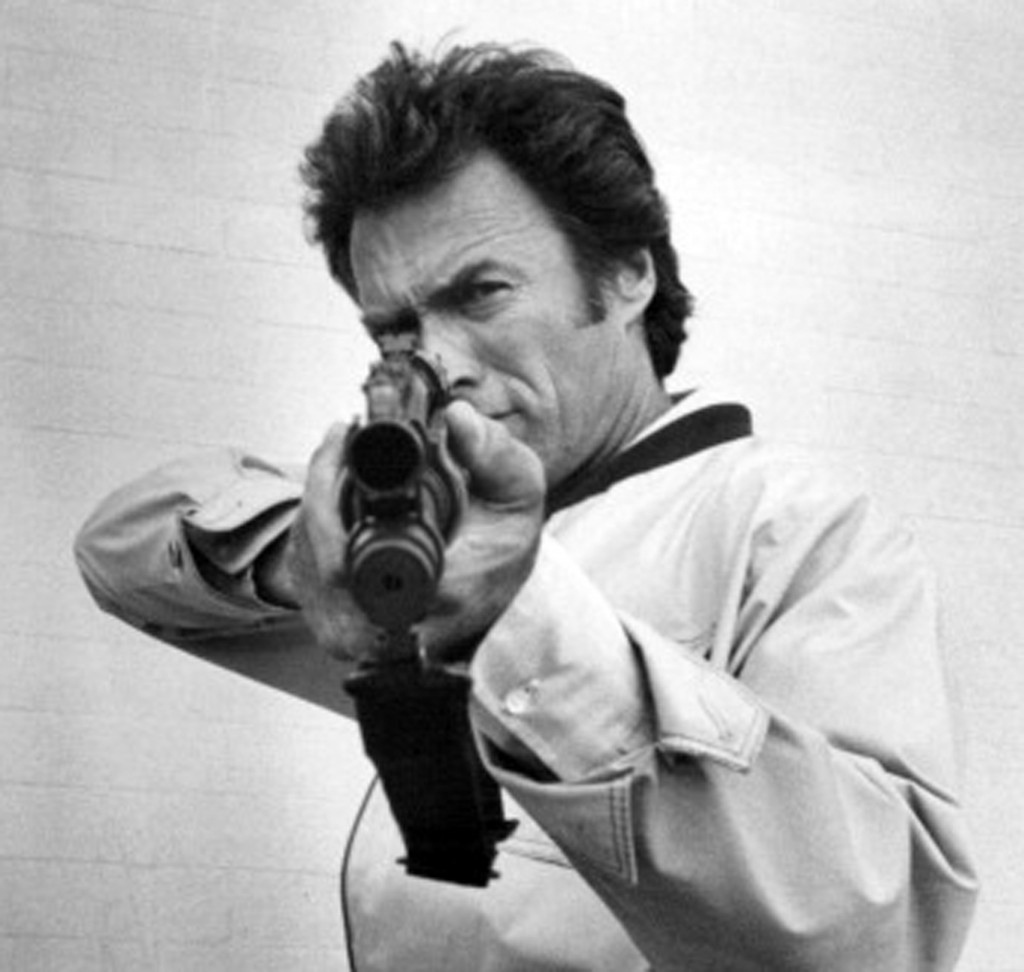 American actor Clint Eastwood aiming a rifle, as detective Harry Callahan in 'The Enforcer', directed by James Fargo, 1976. (Photo by Silver Screen Collection/Getty Images)