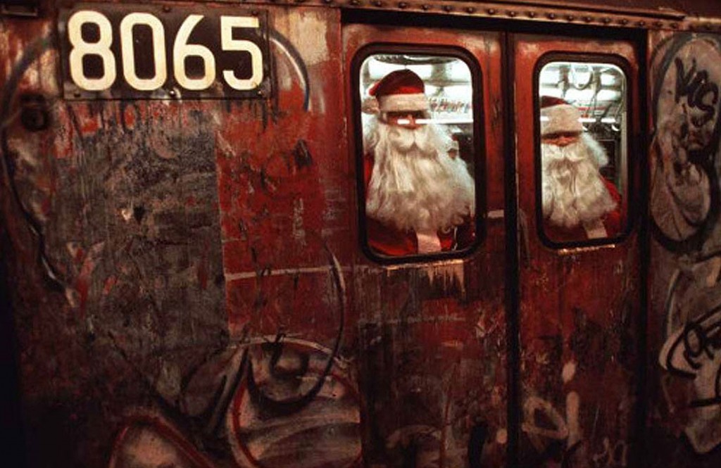 Volunteers of America "Sidewalk Santa's" at 7:00 A.M. on the subway on their way to their postings in mid-town Manhattan.