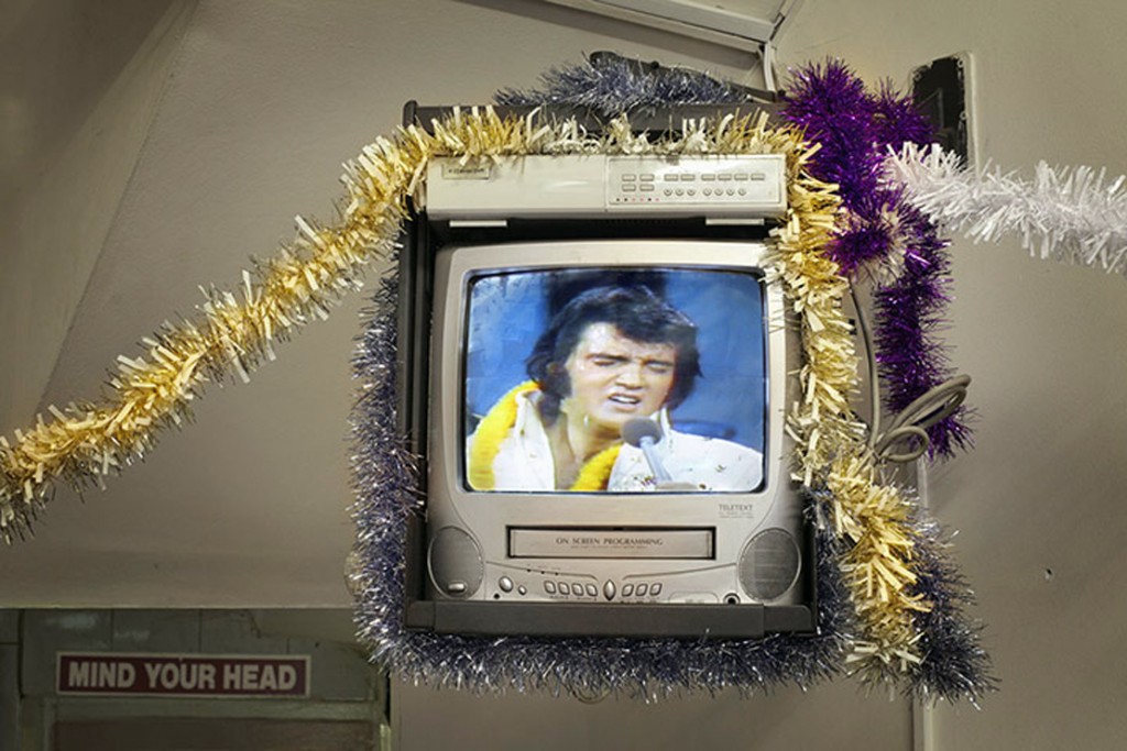 TV screen showing Elvis with tinsel